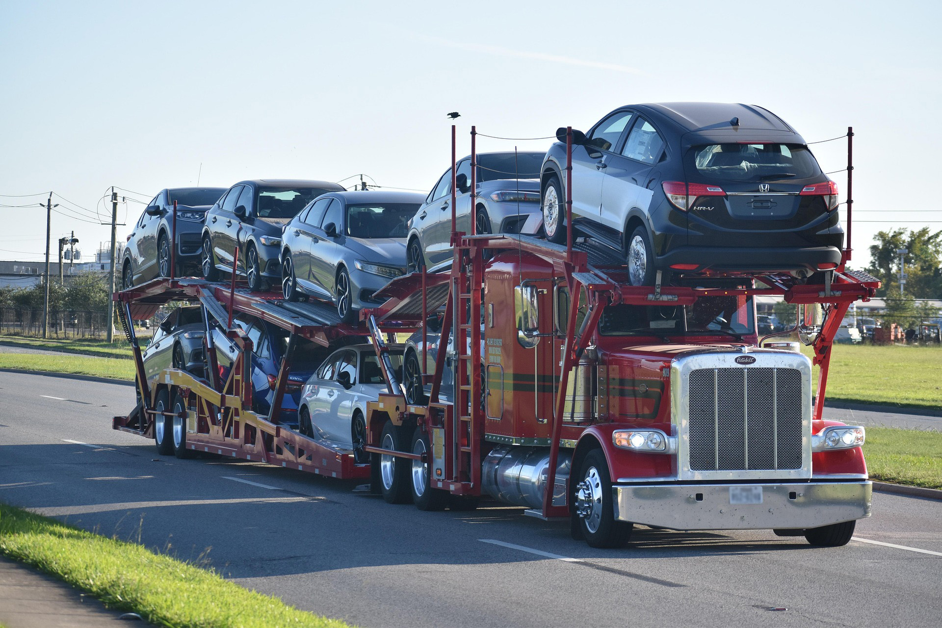 Open trailer vehicle transport